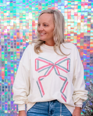 packages with strings sweatshirt