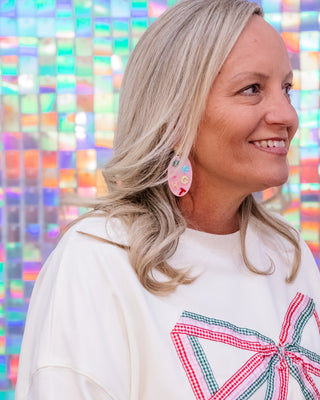 packages with strings sweatshirt