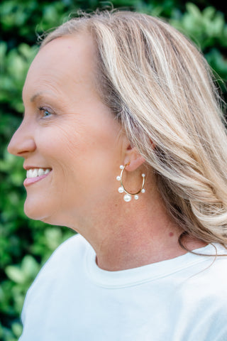 gold toned pearl hoops