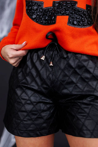 black vegan leather quilted shorts